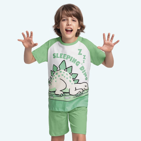 Pijama Dino verde brilla en la oscuridad